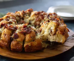 Delicious Bacon Gorgonzola Pull Aparts featuring crispy bacon and creamy blue cheese layered in soft bread.